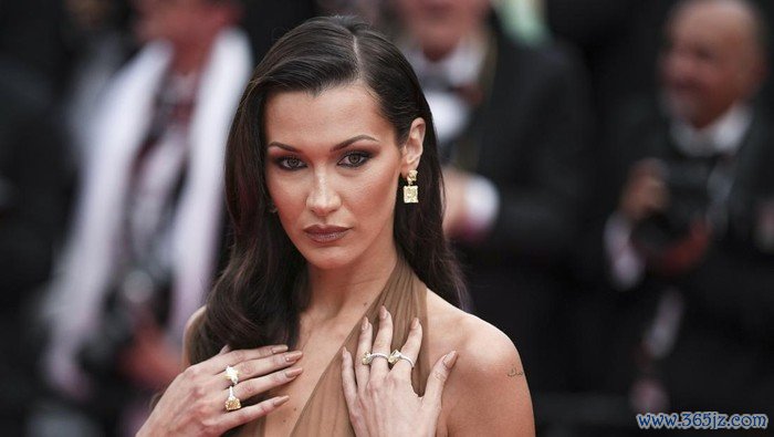 Bella Hadid poses for photographers upon arrival at the premiere of the film The Apprentice at the 77th international film festival, Cannes, southern France, Monday, May 20, 2024. (Photo by Daniel Cole/Invision/AP)